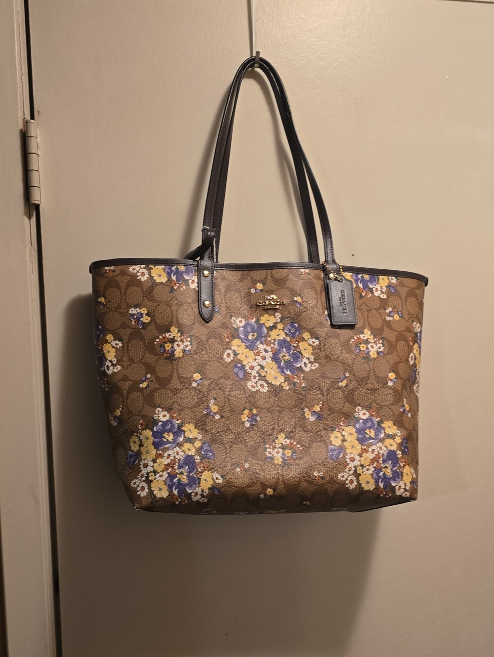 Reversible Coach Brown Signature Floral Tote with Yellow & Purple Accents